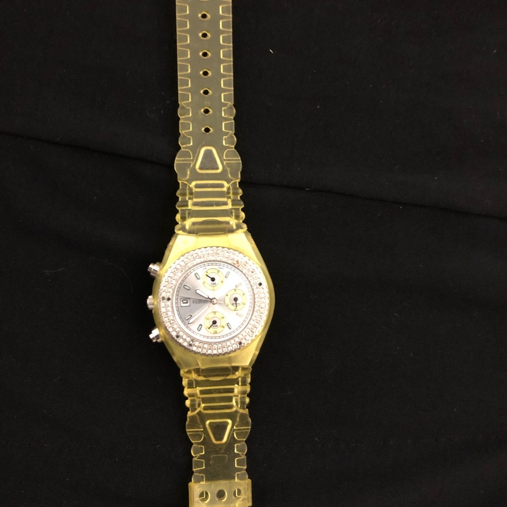 2 watches rubber bands and very pretty watch face